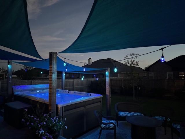 386 Frederick Dr, Robinson, TX 76706 - fenced backyard with a hot tub