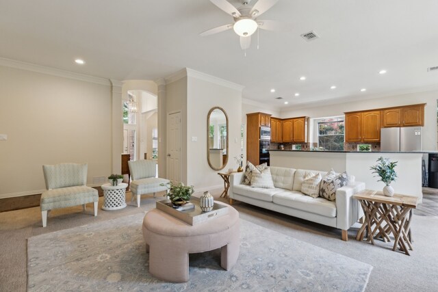 6305 Glenhollow Dr, Plano, TX 75093 - living area featuring crown molding, recessed lighting, light carpet, ceiling fan, and baseboards