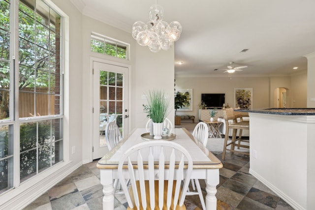 6305 Glenhollow Dr, Plano, TX 75093 - dining room with ceiling fan, stone finish floors, ornamental molding, a chandelier, and baseboards