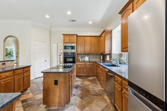 6305 Glenhollow Dr, Plano, TX 75093 - kitchen with black appliances, a center island, stone tile floors, a sink, and ornamental molding