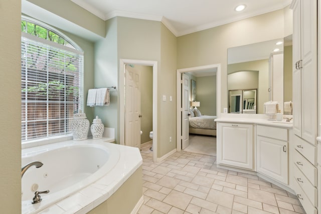 6305 Glenhollow Dr, Plano, TX 75093 - ensuite bathroom featuring a whirlpool tub, toilet, vanity, crown molding, and baseboards