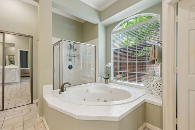 6305 Glenhollow Dr, Plano, TX 75093 - bathroom featuring a shower stall, a jetted tub, crown molding, and baseboards