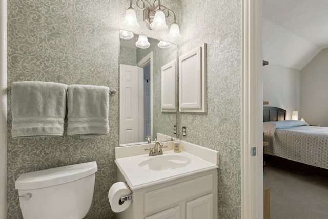 6305 Glenhollow Dr, Plano, TX 75093 - ensuite bathroom with a chandelier, vanity, lofted ceiling, toilet, and wallpapered walls