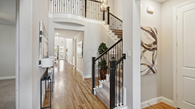 15270 Catalpa Rd, Frisco, TX 75035 - foyer entrance with stairs, wood finished floors, and baseboards