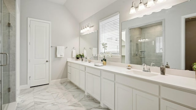 15270 Catalpa Rd, Frisco, TX 75035 - full bathroom featuring a shower stall, double vanity, marble look tile flooring, and lofted ceiling