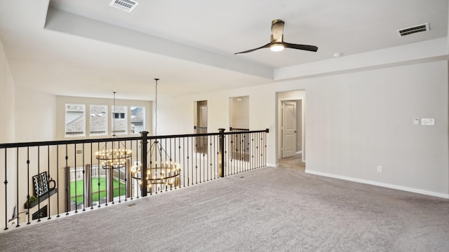 15270 Catalpa Rd, Frisco, TX 75035 - carpeted empty room featuring a chandelier, a ceiling fan, and baseboards