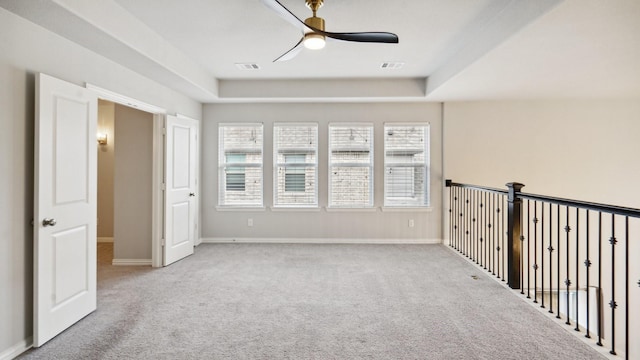 15270 Catalpa Rd, Frisco, TX 75035 - unfurnished bedroom featuring carpet floors, a raised ceiling, baseboards, and ceiling fan