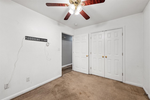 600 Calumet St, Waco, TX 76704 - unfurnished bedroom featuring carpet floors, baseboards, a closet, and a ceiling fan