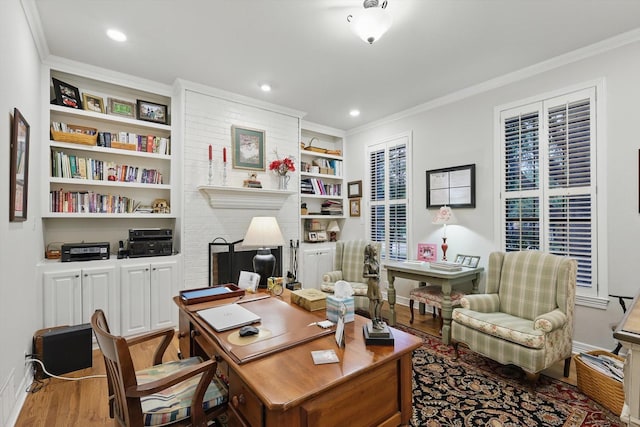 3833 Montecito Dr, Denton, TX 76205 - office space with wood finished floors, crown molding, baseboards, built in features, and recessed lighting