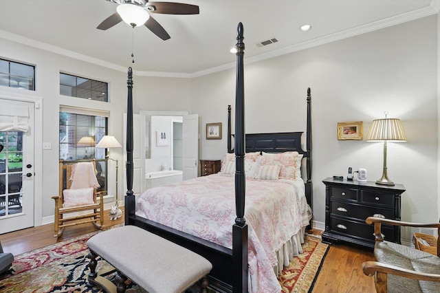 3833 Montecito Dr, Denton, TX 76205 - bedroom featuring wood finished floors, crown molding, ensuite bathroom, a ceiling fan, and baseboards