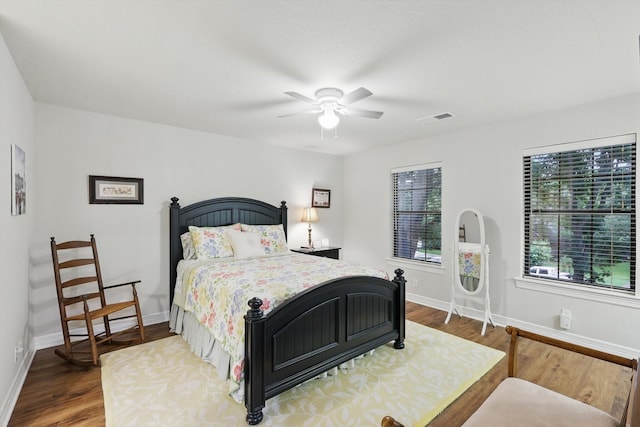 3833 Montecito Dr, Denton, TX 76205 - bedroom with wood finished floors, baseboards, and ceiling fan