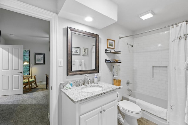 3833 Montecito Dr, Denton, TX 76205 - full bath with vanity, shower / bath combo with shower curtain, and toilet