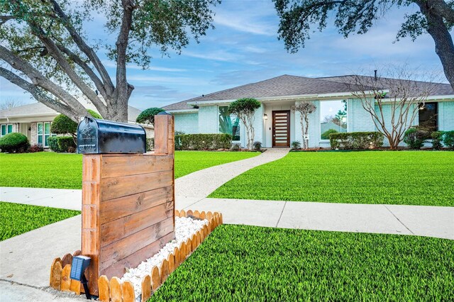 1705 Danube Ln, Plano, TX 75075 - single story home with a front lawn and brick siding