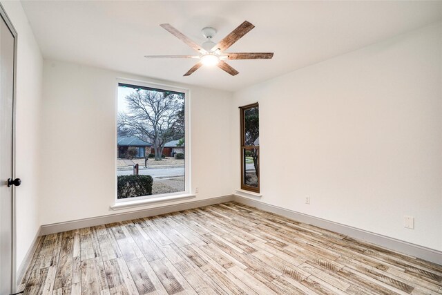 1705 Danube Ln, Plano, TX 75075 - unfurnished room with wood finished floors, ceiling fan, and baseboards