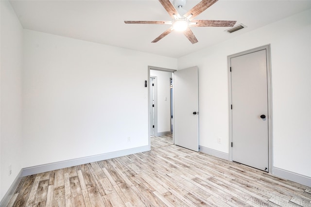 1705 Danube Ln, Plano, TX 75075 - unfurnished bedroom with light wood finished floors, baseboards, and ceiling fan