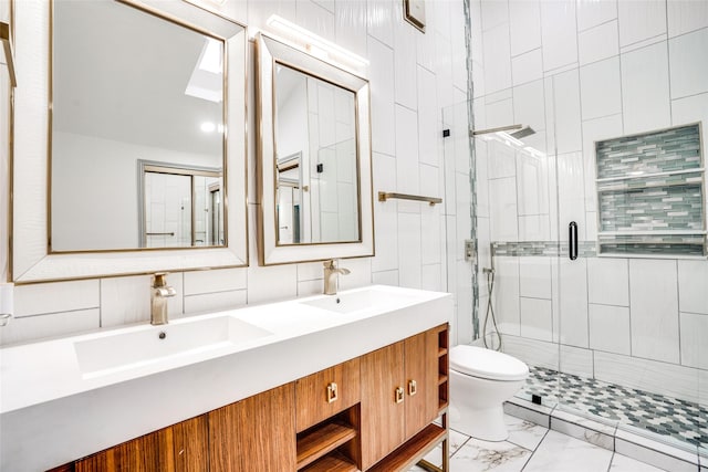 1705 Danube Ln, Plano, TX 75075 - bathroom featuring toilet, a stall shower, double vanity, and marble look tile flooring