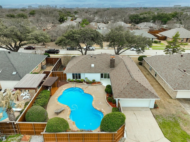 1705 Danube Ln, Plano, TX 75075 - outdoor pool featuring a fenced backyard and a residential view