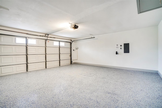1705 Danube Ln, Plano, TX 75075 - garage with electric panel, a garage door opener, and baseboards