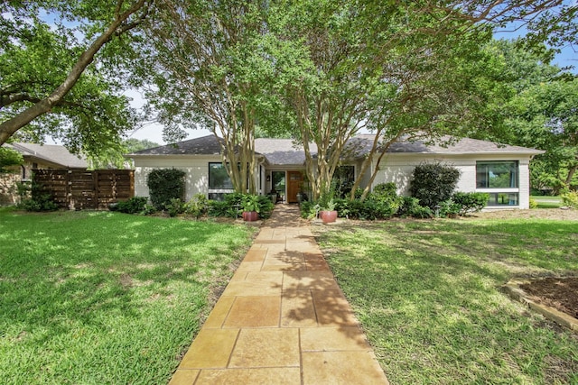 3330 Creekbend Dr, Garland, TX 75044 - ranch-style house with a front lawn, brick siding, and a shingled roof