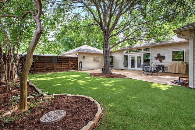 3330 Creekbend Dr, Garland, TX 75044 - view of yard with french doors and a patio area