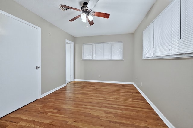 1306 Blanton Pl, Sherman, TX 75092 - unfurnished bedroom with wood finished floors and a ceiling fan