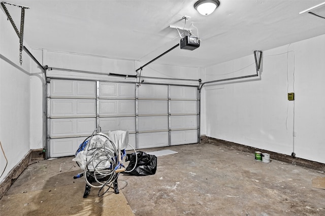 1306 Blanton Pl, Sherman, TX 75092 - garage with a garage door opener and baseboards