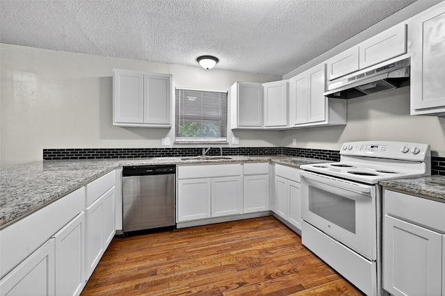 1306 Blanton Pl, Sherman, TX 75092 - kitchen featuring stainless steel dishwasher, white electric range, under cabinet range hood, white cabinetry, and a textured ceiling