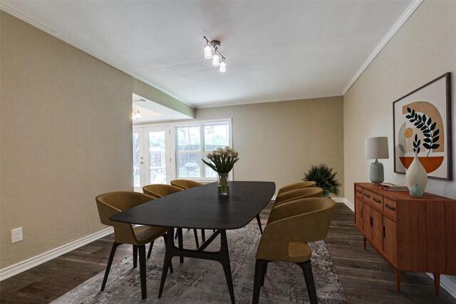 801 Northshore Dr, Garland, TX 75040 - dining space featuring ornamental molding, dark wood-style flooring, and baseboards