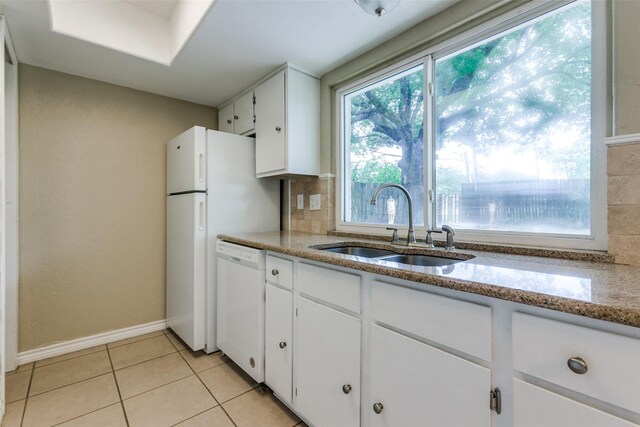 801 Northshore Dr, Garland, TX 75040 - kitchen with dishwasher, a sink, decorative backsplash, and white cabinetry