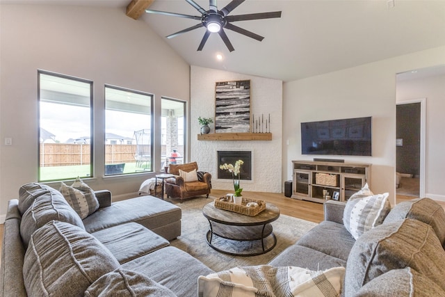 3109 Twin Eagles Dr, Celina, TX 75009 - living area with a ceiling fan, a fireplace, wood finished floors, and recessed lighting