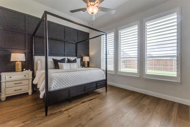 3109 Twin Eagles Dr, Celina, TX 75009 - bedroom featuring wood finished floors, baseboards, and a ceiling fan