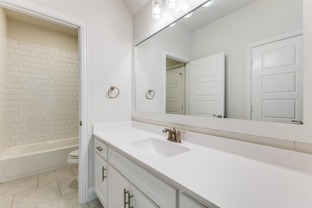 3109 Twin Eagles Dr, Celina, TX 75009 - bathroom featuring vanity, toilet, tile patterned flooring, and shower / bathtub combination