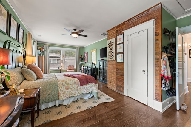 2307 5th Ave, Fort Worth, TX 76110 - bedroom featuring wood finished floors, ornamental molding, and a ceiling fan