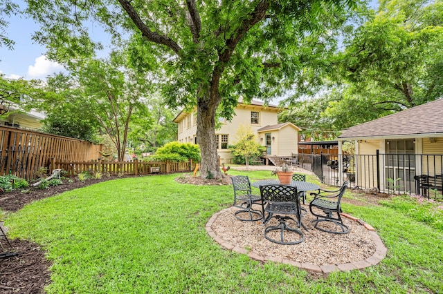 2307 5th Ave, Fort Worth, TX 76110 - view of yard featuring outdoor dining area