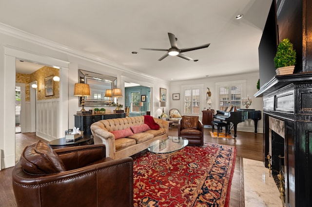 2307 5th Ave, Fort Worth, TX 76110 - living area with a ceiling fan, a premium fireplace, crown molding, wood finished floors, and wainscoting