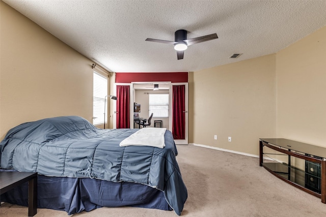 5504 Cedar Mountain Dr, Mckinney, TX 75071 - bedroom featuring carpet, a textured ceiling, a ceiling fan, and baseboards