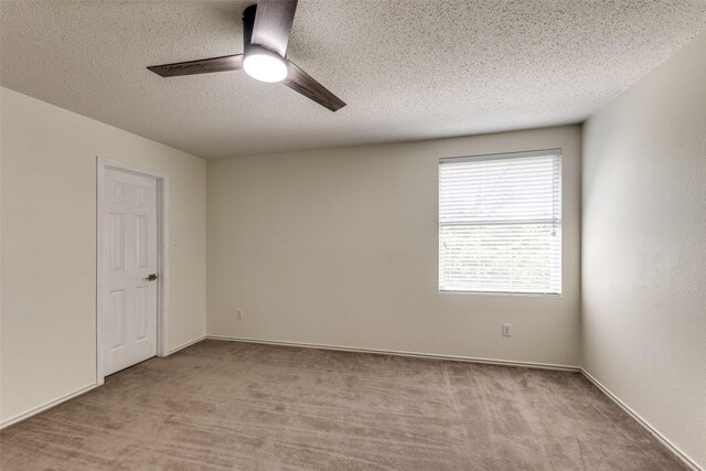 5504 Cedar Mountain Dr, Mckinney, TX 75071 - spare room with a ceiling fan, carpet, and a textured ceiling