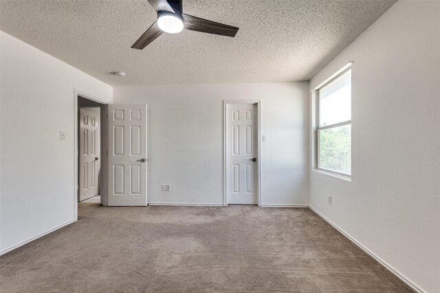 5504 Cedar Mountain Dr, Mckinney, TX 75071 - unfurnished bedroom with a textured ceiling, carpet flooring, and ceiling fan