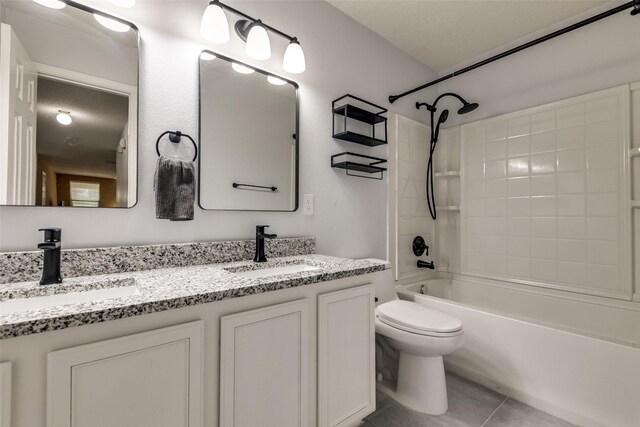 5504 Cedar Mountain Dr, Mckinney, TX 75071 - bathroom featuring double vanity, tile patterned floors, shower / tub combination, and toilet