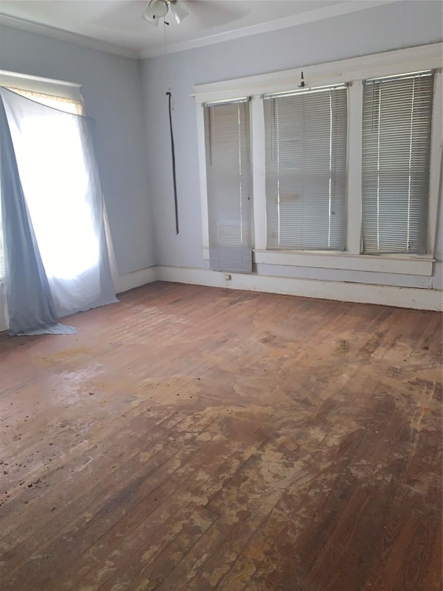 1602 Mitchell Ave, Waco, TX 76708 - spare room featuring hardwood / wood-style flooring, crown molding, baseboards, and a ceiling fan