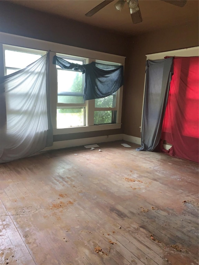1602 Mitchell Ave, Waco, TX 76708 - unfurnished room featuring hardwood / wood-style flooring and ceiling fan