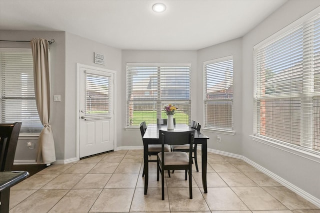 12428 Leaflet Dr, Fort Worth, TX 76244 - dining area with light tile patterned floors, baseboards, and recessed lighting