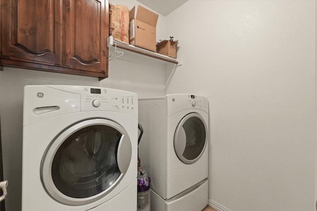 12428 Leaflet Dr, Fort Worth, TX 76244 - laundry area with washing machine and clothes dryer and cabinet space