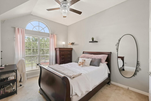12428 Leaflet Dr, Fort Worth, TX 76244 - bedroom featuring light carpet, multiple windows, baseboards, lofted ceiling, and a ceiling fan