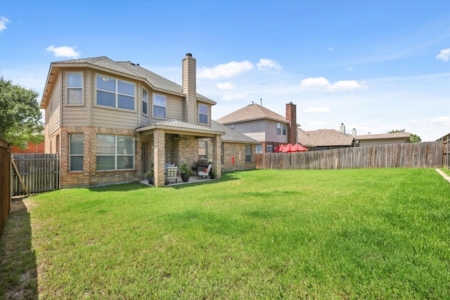 12428 Leaflet Dr, Fort Worth, TX 76244 - rear view of house featuring a patio, brick siding, and a chimney