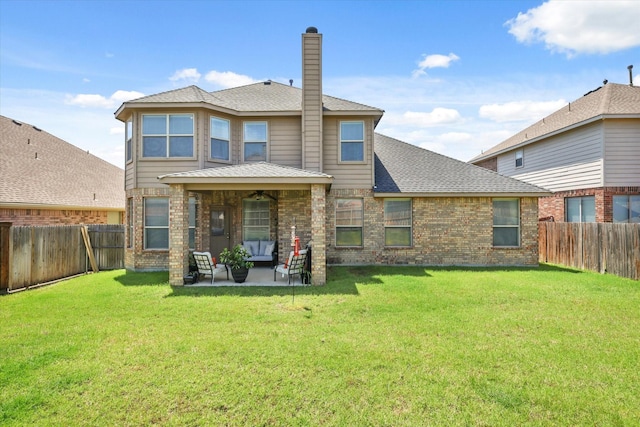 12428 Leaflet Dr, Fort Worth, TX 76244 - back of house featuring outdoor lounge area, ceiling fan, a patio area, and brick siding