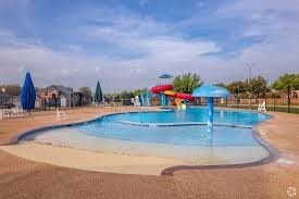 12428 Leaflet Dr, Fort Worth, TX 76244 - community pool with a patio