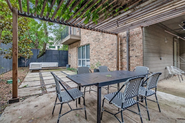 4518 Gilbert Ave, Dallas, TX 75219 - view of patio with outdoor dining space and a balcony