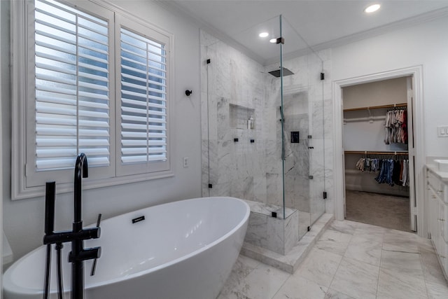4518 Gilbert Ave, Dallas, TX 75219 - full bathroom with marble finish flooring, a marble finish shower, crown molding, a soaking tub, and a walk in closet
