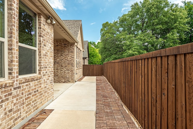 202 Woodland Pond Dr, Allen, TX 75013 - fenced backyard featuring a patio